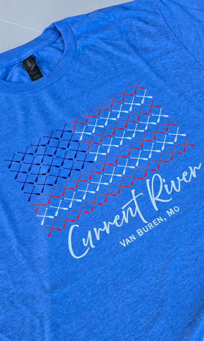 Heather blue t-shirt with a graphic design of multiple canoe paddles arranged to look like a US Flag. The text "Current River Van Buren, Mo" is at the bottom. 